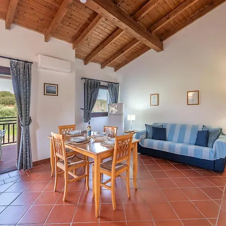 With Air Conditioning And Shared Pool, Just A Few Minutes From La Pelosa