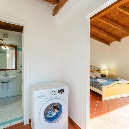 With Air Conditioning And Shared Pool, Just A Few Minutes From La Pelosa 3*