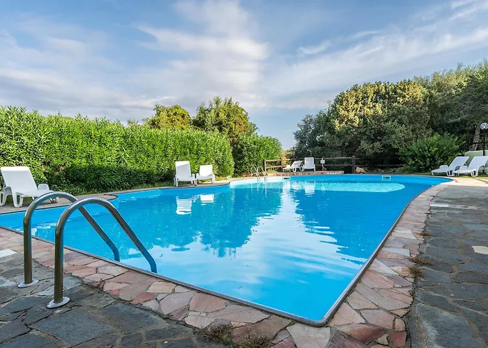 With Air Conditioning And Shared Pool, Just A Few Minutes From La Pelosa 3*