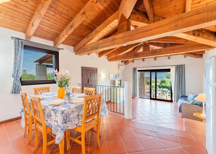With Air Conditioning And Shared Pool, Just A Few Minutes From La Pelosa 3*